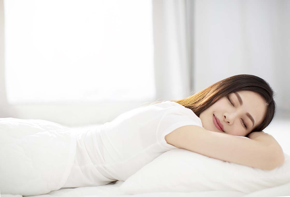 beautiful Young woman sleeping in bed