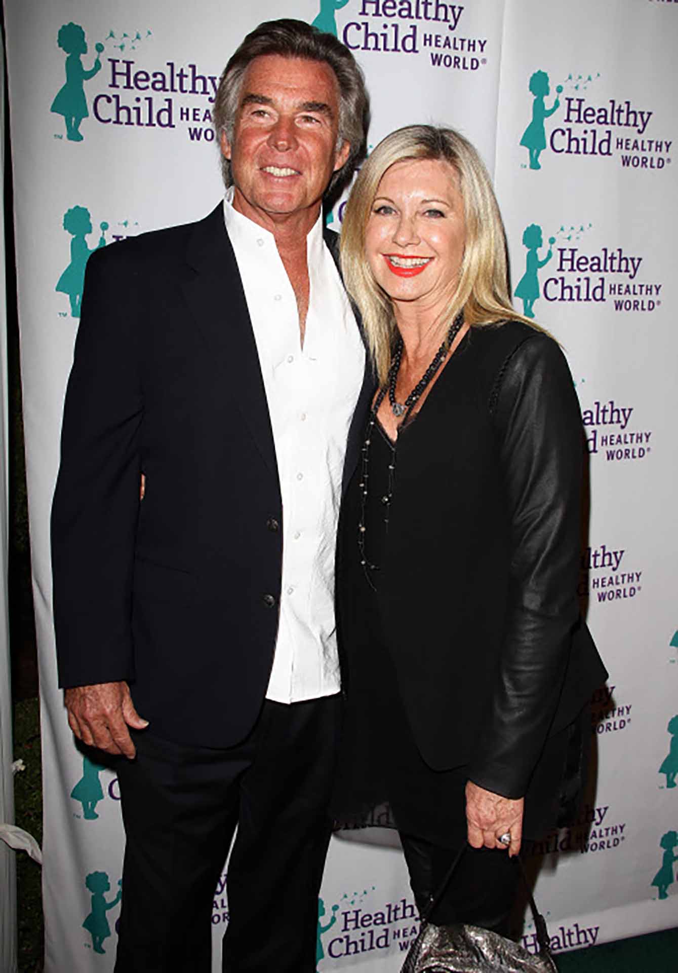 Actress Olivia Newton John and John Easterling attending Healthy Child Healthy World’s Mom On A Mission Gala on November 6th, 2013.