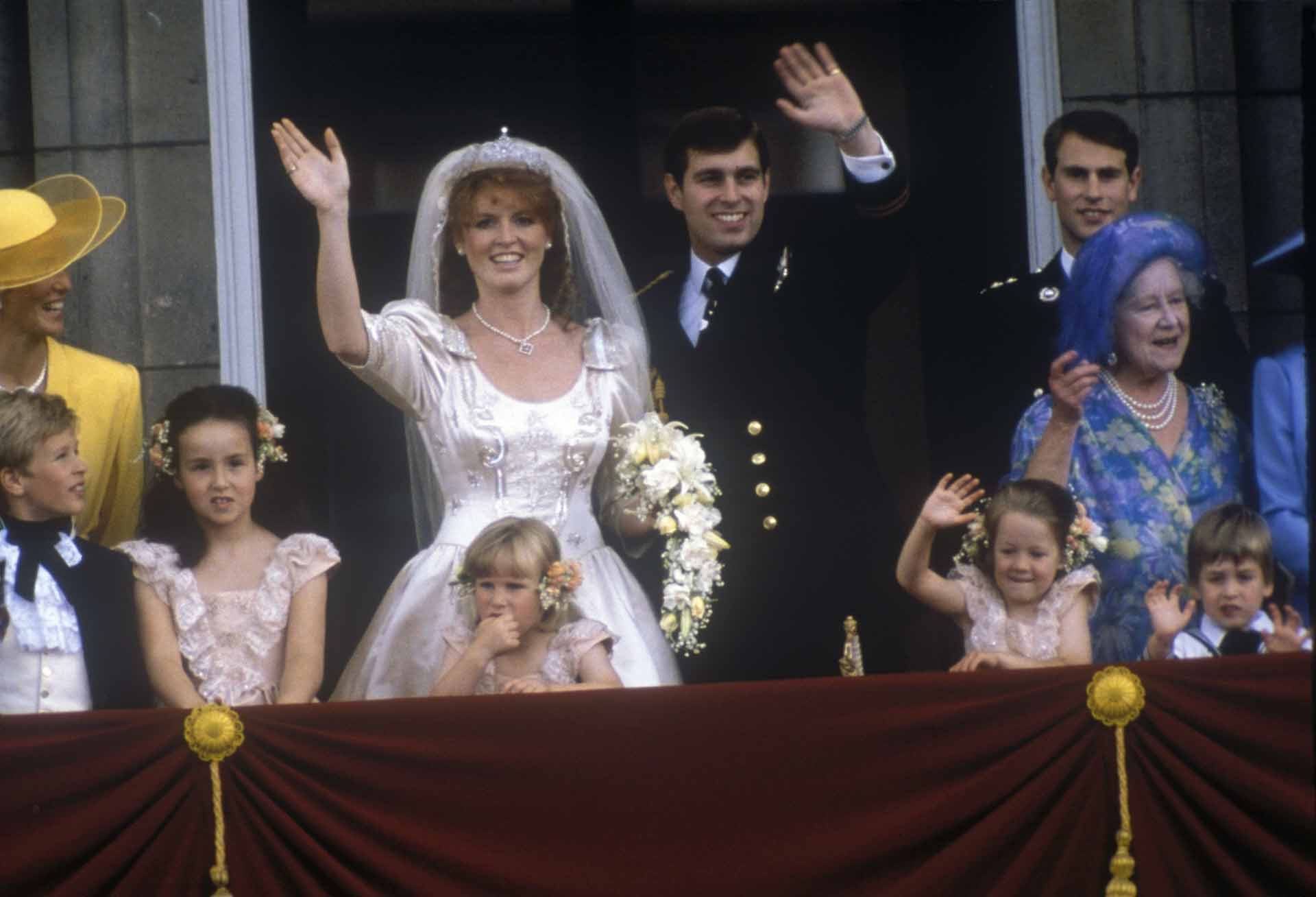 Prince Andrew and Sarah Ferguson during their wedding in London, July 23, 1986.  At left is the prince’s brother and best man Prince Edward, and the Queen Mother.  Front right is Prince William of Wales. Front second from left is bridesmaid Zara Phillips.