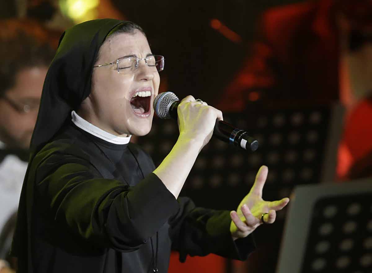 Sister Cristina Scuccia performs during a concert in Rome, Saturday, Dec. 13, 2014.